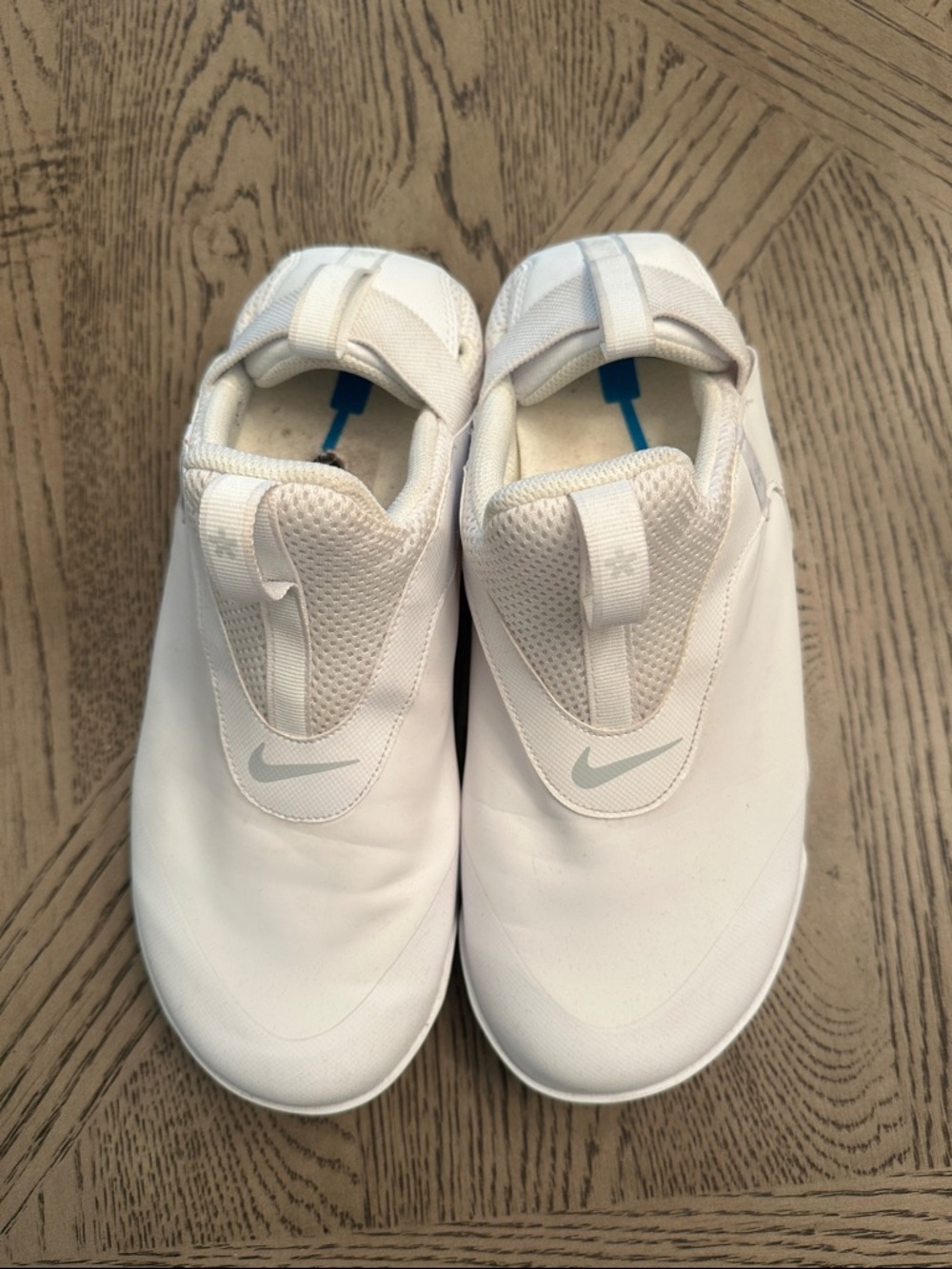 Nike White Slip-On Trainers with Light Gray Swoosh